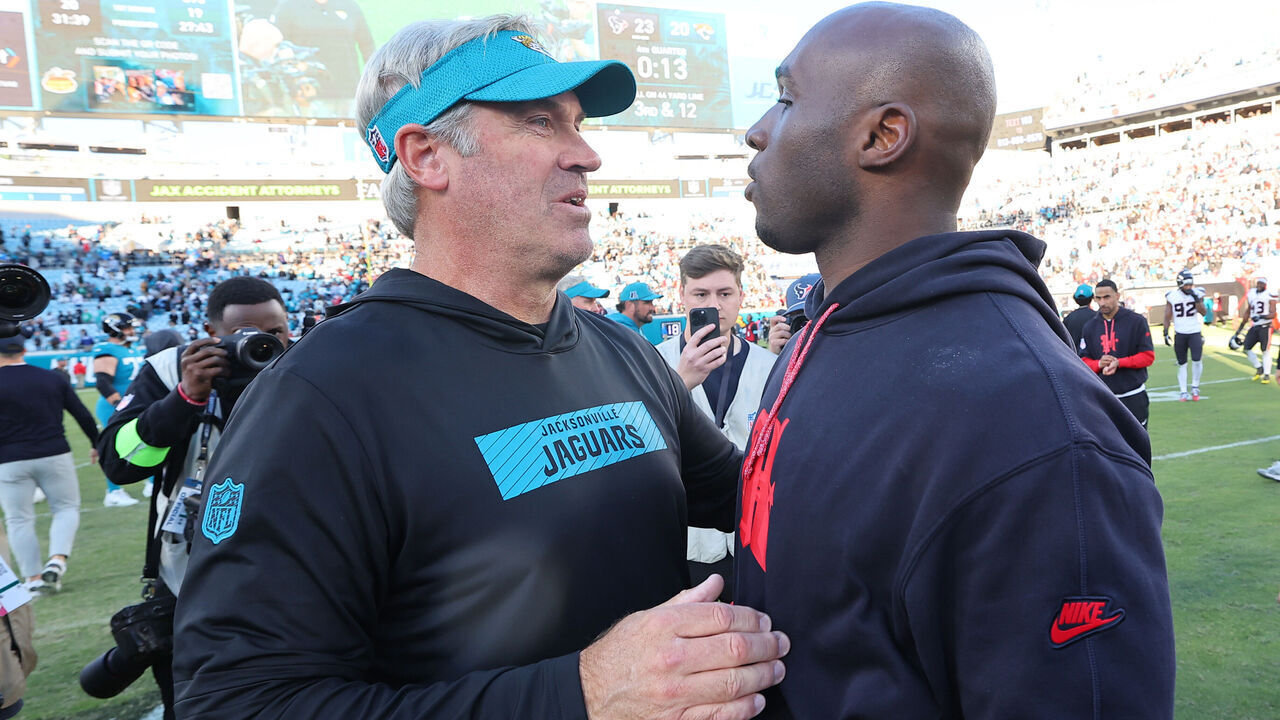 JACKSONVILLE, FLORIDA - DECEMBER 01: Head coaches DeMeco Ryans of the Houston Texans and Doug Pederson of the Jacksonville Jaguars meet after the game at EverBank Stadium on December 01, 2024 in Jacksonville, Florida. The Texans beat Jaguars 23-20.
