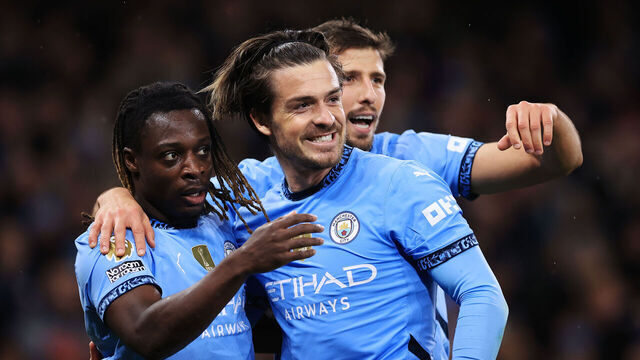 MANCHESTER, ENGLAND - DECEMBER 4: Jeremy Doku of Manchester City (L) celebrates with Jack Grealish of Manchester City (C) and Ruben Dias of Manchester City (R)after scoring their 3rd goal during the Premier League match between Manchester City FC and Nottingham Forest FC at Etihad Stadium on December 4, 2024 in Manchester, England.