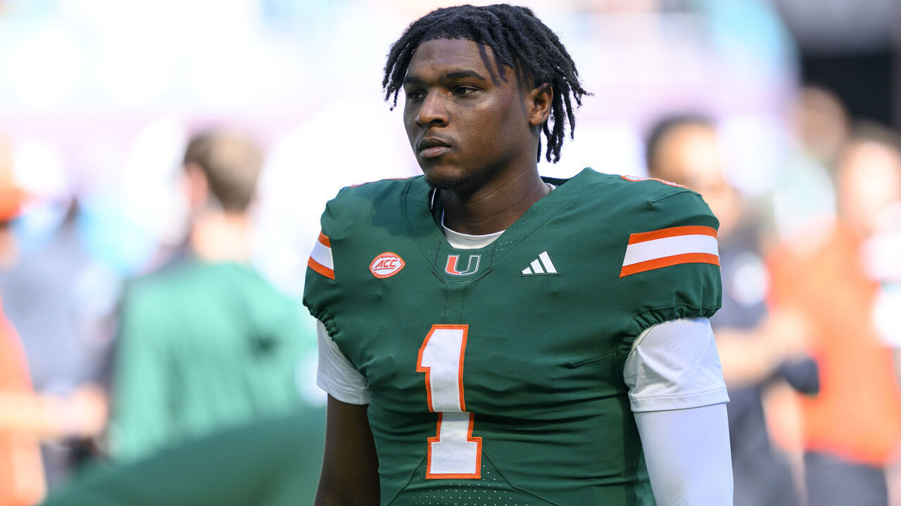 MIAMI GARDENS, FL - NOVEMBER 23: Miami quarterback Cam Ward (1) walks on the field before the college football game between the Wake Forest Deacon Demons and the University of Miami Hurricanes on November 23, 2024 at the Hard Rock Stadium in Miami Gardens, FL.