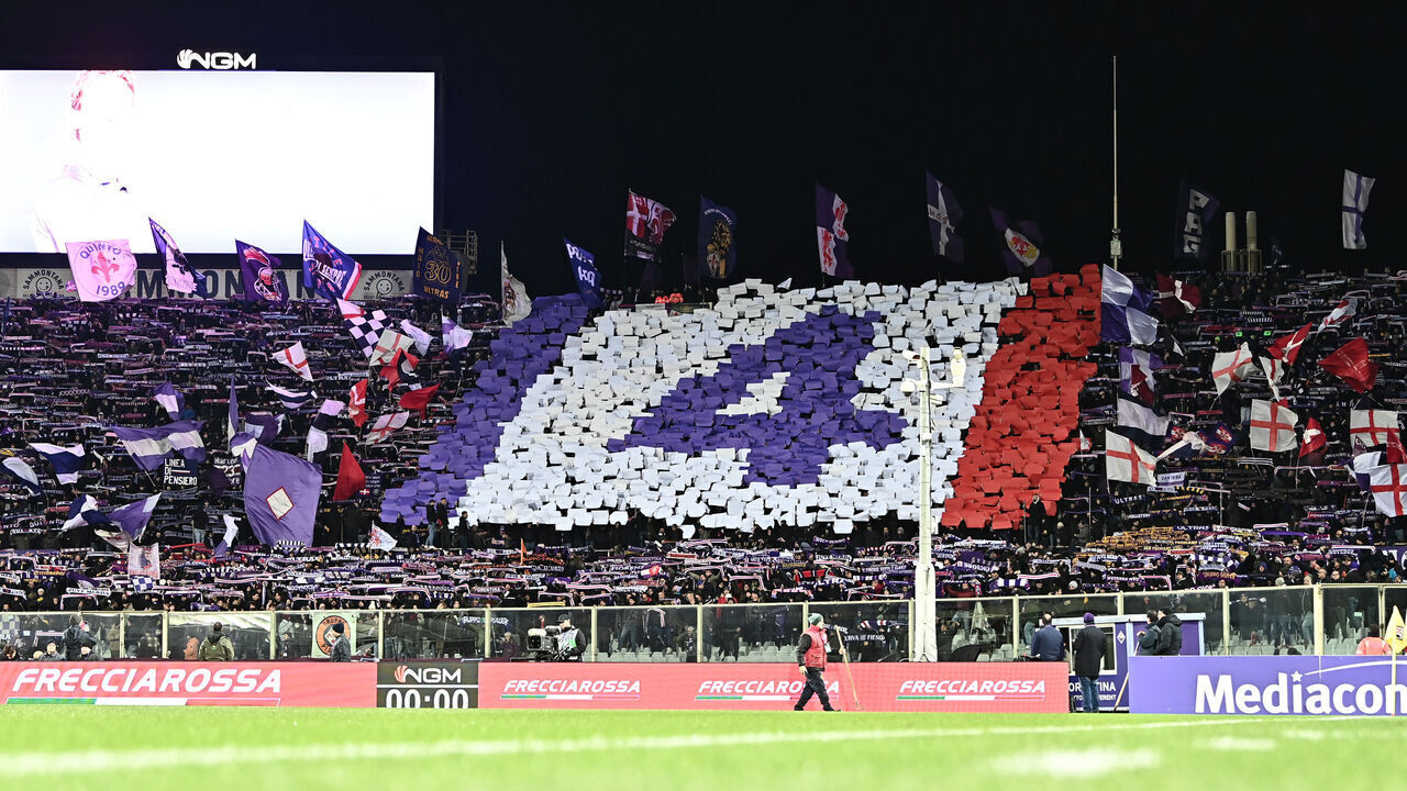 FLORENCE, ITALY - DECEMBER 04: fans of Fiorentina with banner for Edoardo Bove during the Coppa Italia match between ACF Fiorentina and Empoli FC at Artemio Franchi on December 04, 2024 in Florence, Italy.
