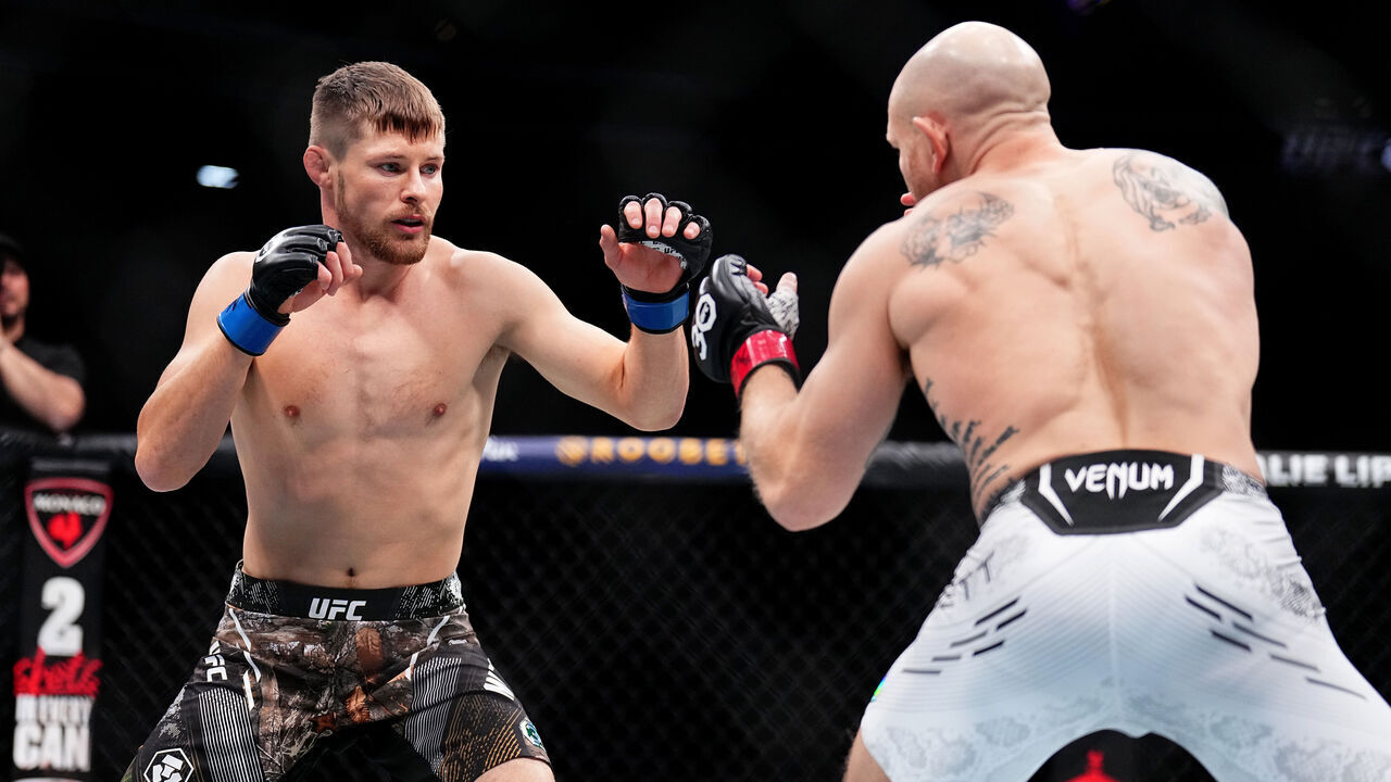 LAS VEGAS, NEVADA - DECEMBER 16: (L-R) Bryce Mitchell faces Josh Emmett in a featherweight fight during the UFC 296 event at T-Mobile Arena on December 16, 2023 in Las Vegas, Nevada.