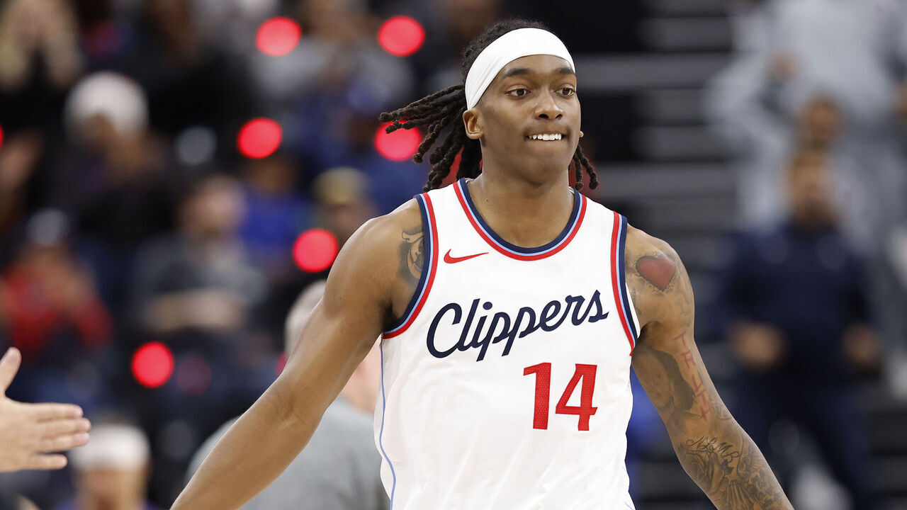 INGLEWOOD, CALIFORNIA - DECEMBER 01: Terance Mann #14 of the LA Clippers after making a three-point shot against the Denver Nuggets in the second half at Intuit Dome on December 01, 2024 in Inglewood, California.