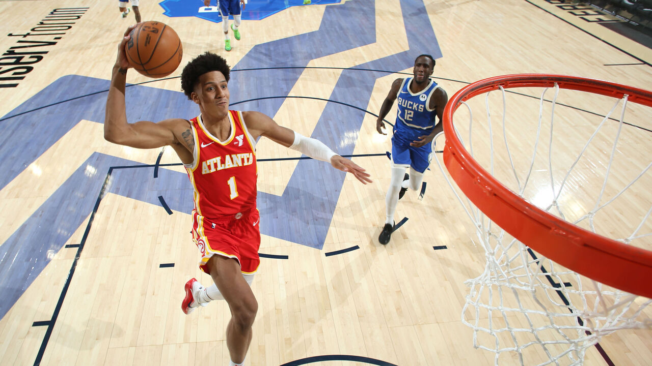 MILWAUKEE, WI - DECEMBER 4: Jalen Johnson #1 of the Atlanta Hawks drives to the basket during the game against the Milwaukee Bucks during a regular season game on December 4, 2024 at Fiserv Forum Center in Milwaukee, Wisconsin. Mandatory Copyright Notice: Copyright 2024 NBAE .