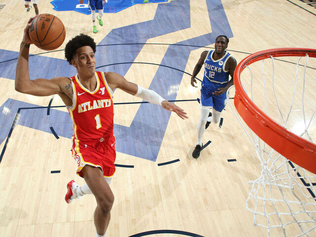 MILWAUKEE, WI - DECEMBER 4: Jalen Johnson #1 of the Atlanta Hawks drives to the basket during the game against the Milwaukee Bucks during a regular season game on December 4, 2024 at Fiserv Forum Center in Milwaukee, Wisconsin. Mandatory Copyright Notice: Copyright 2024 NBAE .