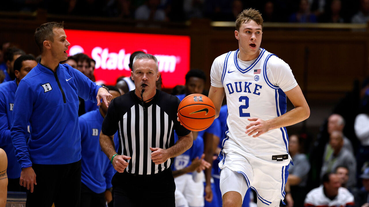 DURHAM, NORTH CAROLINA - DECEMBER 4: Cooper Flagg #2 of the Duke Blue Devils dribbles up court against the Auburn Tigers during the first half of the game at Cameron Indoor Stadium on December 4, 2024 in Durham, North Carolina.