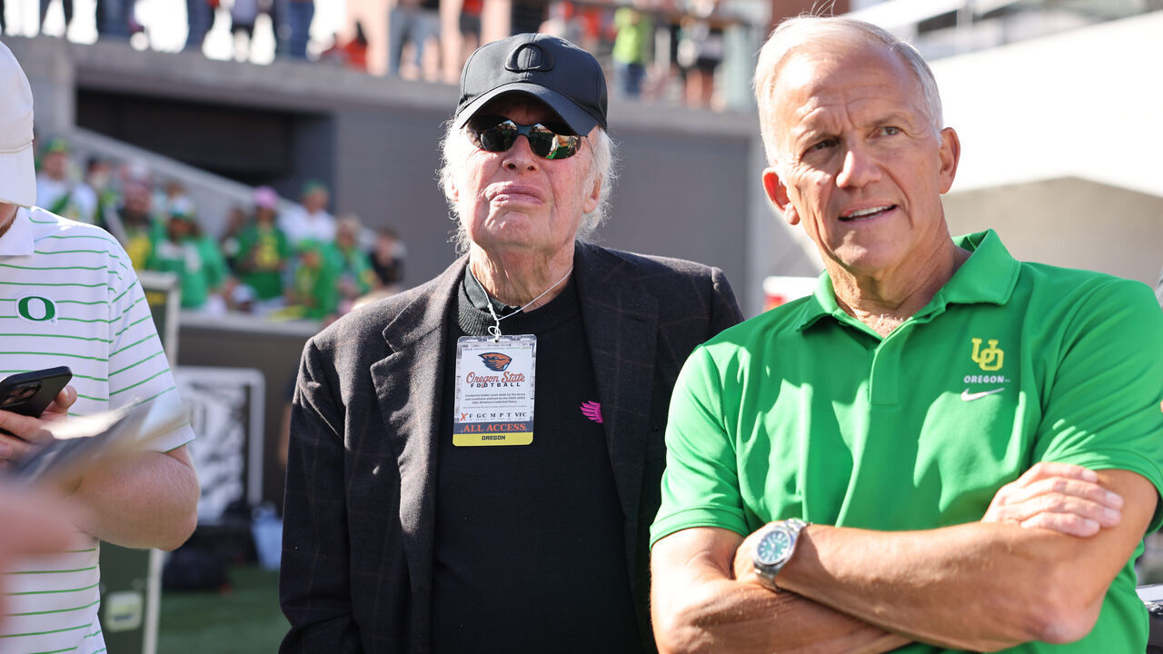 CORVALLIS, OREGON - SEPTEMBER 14: Phil Knight stands on the sidelines during a game between the Oregon Ducks and the Oregon State Beavers during the second half at Reser Stadium on September 14, 2024 in Corvallis, Oregon.