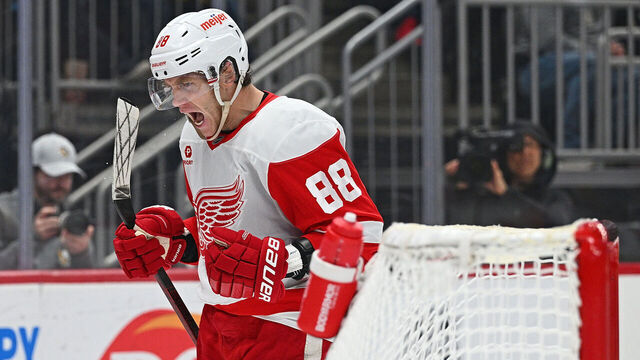 PITTSBURGH, PENNSYLVANIA - NOVEMBER 13: Patrick Kane #88 of the Detroit Red Wings reacts after scoring a goal in the second period against the Pittsburgh Penguins at PPG PAINTS Arena on November 13, 2024 in Pittsburgh, Pennsylvania.