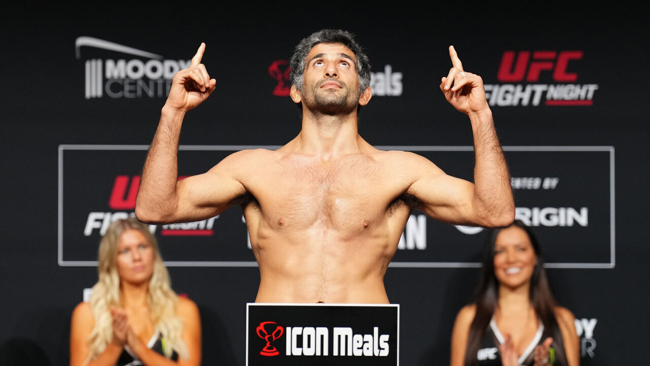 AUSTIN, TEXAS - DECEMBER 01: Beneil Dariush of Iran poses on the scale during the UFC Fight Night ceremonial weigh-in at Moody Center on December 01, 2023 in Austin, Texas.