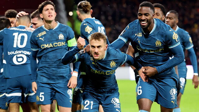 LENS, FRANCE - NOVEMBER 23: Valentin Rongier #21 of Marseille celebrate his first goal with Ulisses Garcia #6 during the Ligue 1 McDonald's match between Racing Club de Lens and Olympique de Marseille at Stade Bollaert-Delelis on November 23, 2024 in Lens, France.