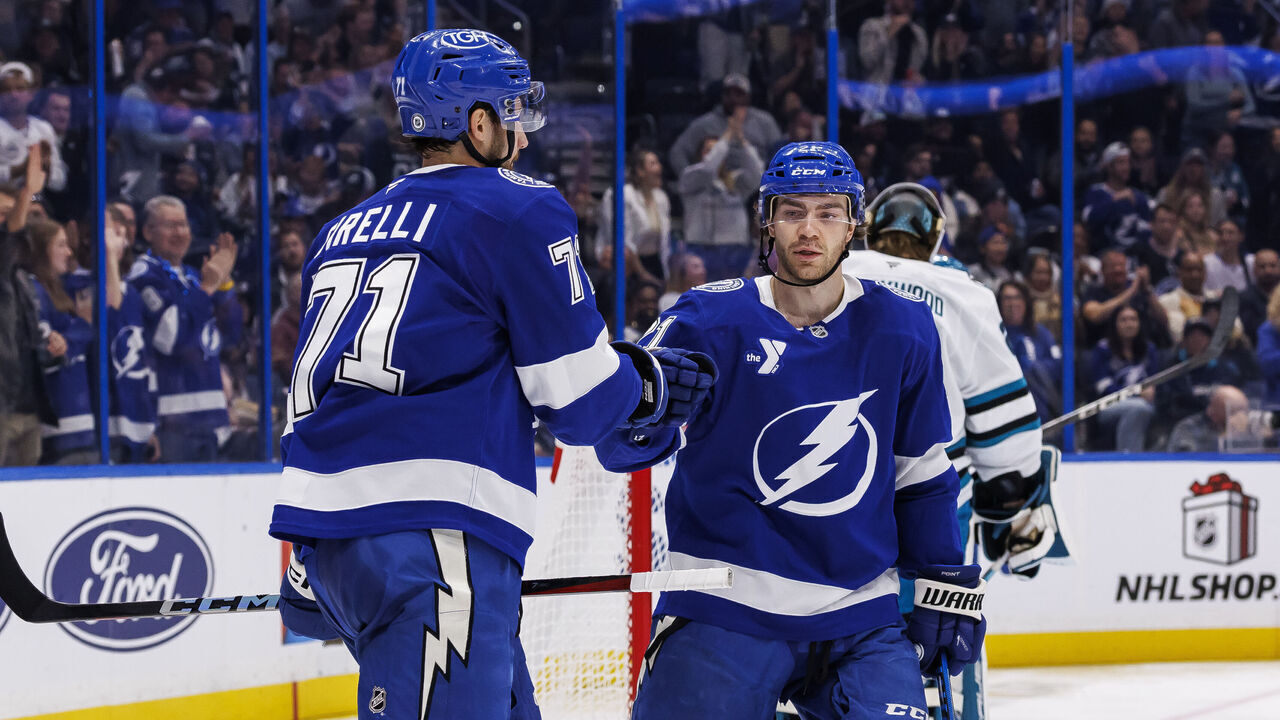 TAMPA, FL - DECEMBER 5: Anthony Cirelli #71 of the Tampa Bay Lightning celebrates a goal with teammate Brayden Point #21 against the San Jose Sharks at Amalie Arena on December 5, 2024 in Tampa, Florida.