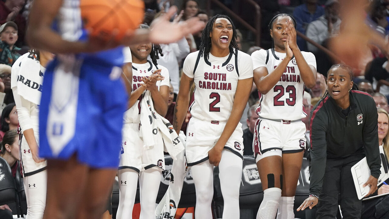 COLUMBIA, SOUTH CAROLINA - DECEMBER 5: Ashlyn Watkins #2 and Bree Hall #23 of the South Carolina Gamecocks celebrate a foul call during the fourth quarter of an NCAA women's basketball game against the Duke Blue Devils at Colonial Life Arena on December 5, 2024 in Columbia, South Carolina. The South Carolina Gamecocks won 81-70.
