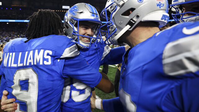 DETROIT, MICHIGAN - DECEMBER 05: Jake Bates #39 of the Detroit Lions celebrates with teammates after making a game-winning field goal in an NFL football game against the Green Bay Packers at Ford Field on December 5, 2024 in Detroit, Michigan.