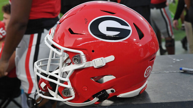 ATHENS, GA - OCTOBER 05: A Georgia Bulldogs football helmet sits on the sideline during the college football game between the Auburn Tigers and the Georgia Bulldogs on October 05, 2024, at Sanford Stadium in Athens, GA.