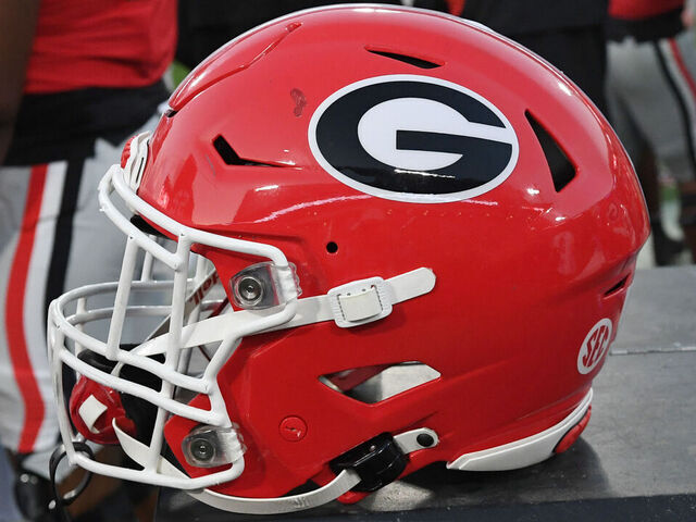 ATHENS, GA - OCTOBER 05: A Georgia Bulldogs football helmet sits on the sideline during the college football game between the Auburn Tigers and the Georgia Bulldogs on October 05, 2024, at Sanford Stadium in Athens, GA.