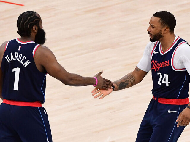 INGLEWOOD, CA - NOVEMBER 4: James Harden #1 and Norman Powell #24 of the LA Clippers high five during the game against the San Antonio Spurs on November 4, 2024 at Intuit Dome in Los Angeles, California. NOTE TO USER: User expressly acknowledges and agrees that, by downloading and/or using this Photograph, user is consenting to the terms and conditions of the Getty Images License Agreement. Mandatory Copyright Notice: Copyright 2024 NBAE