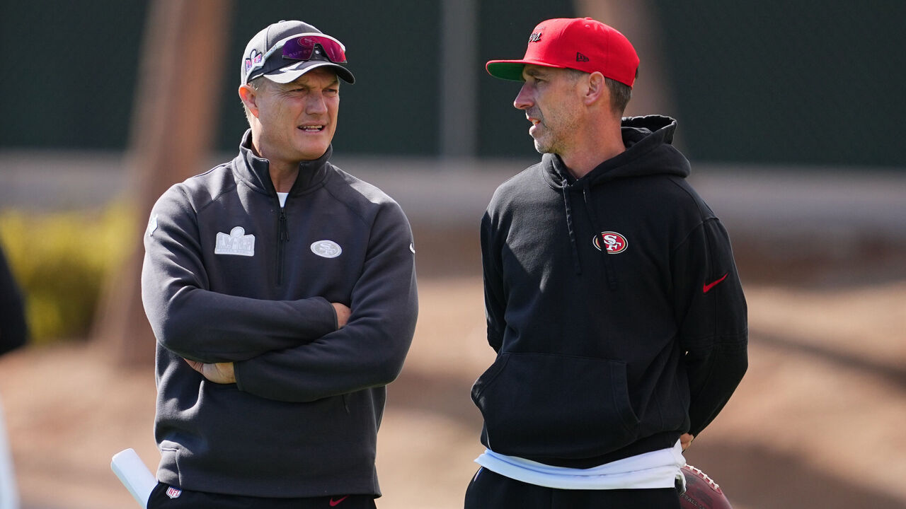 LAS VEGAS, NEVADA - FEBRUARY 07: (L-R) General manager John Lynch and head coach Kyle Shanahan speak during San Francisco 49ers practice ahead of Super Bowl LVIII at Fertitta Football Complex on February 07, 2024 in Las Vegas, Nevada.