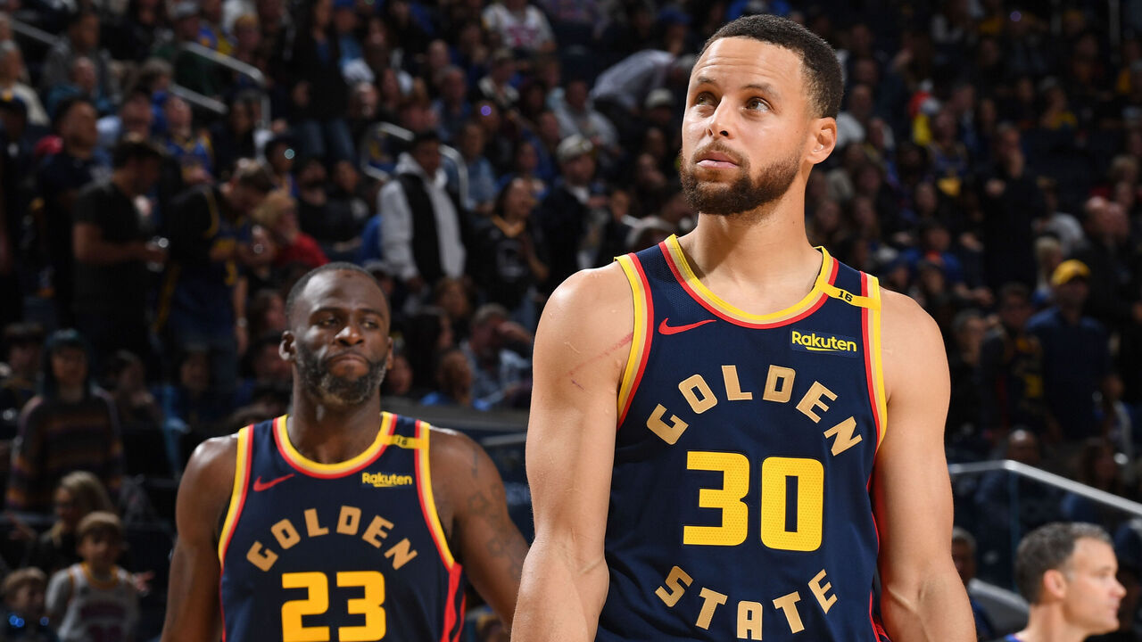 SAN FRANCISCO, CA - NOVEMBER 25: Draymond Green #23 and Stephen Curry #30 of the Golden State Warriors look on during the game against the Brooklyn Nets on November 25, 2024 at Chase Center in San Francisco, California. NOTE TO USER: User expressly acknowledges and agrees that, by downloading and or using this photograph, user is consenting to the terms and conditions of Getty Images License Agreement. Mandatory Copyright Notice: Copyright 2024 NBAE