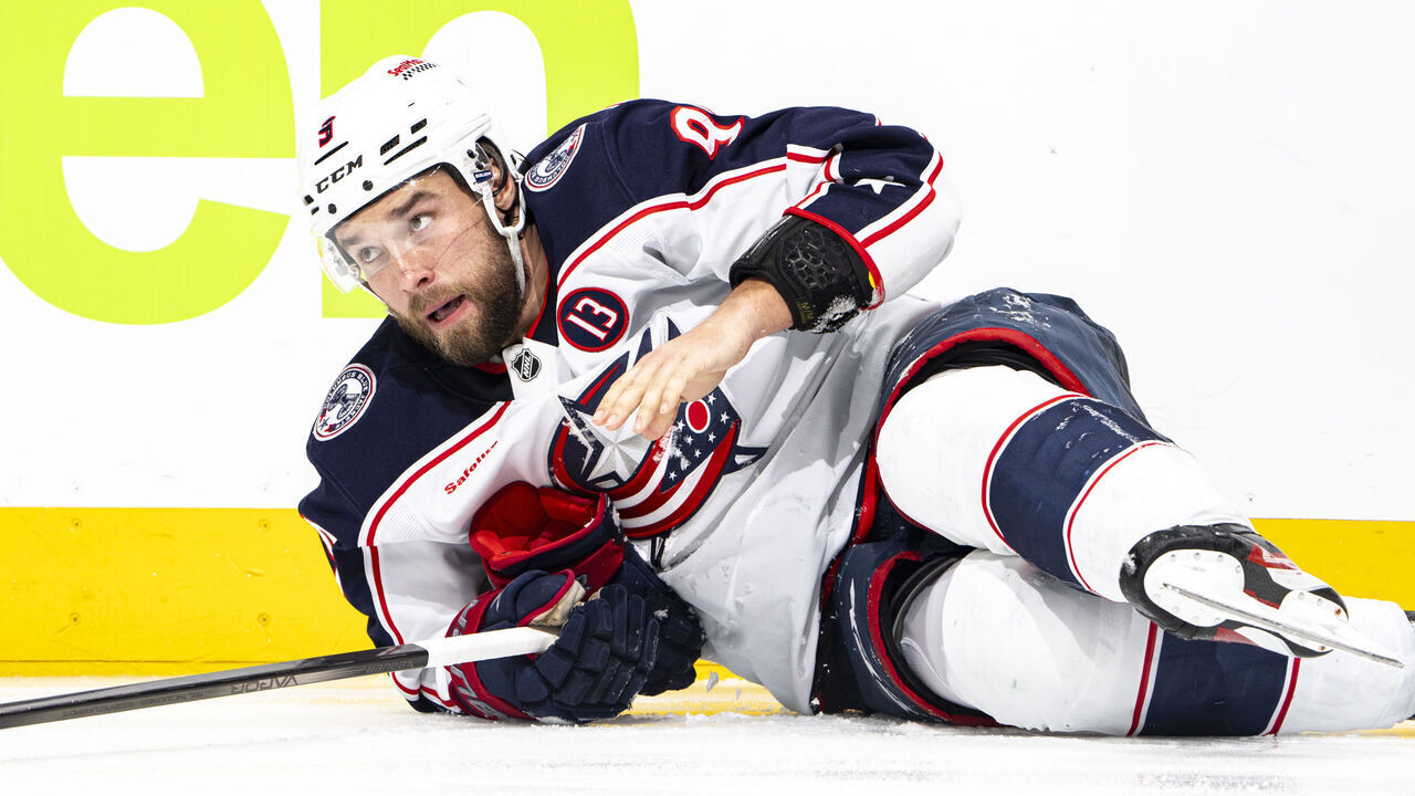 VANCOUVER, CANADA - DECEMBER 6: Ivan Provorov #9 of the Columbus Blue Jackets lays on the ice after tripping during the second period of their NHL game against the Vancouver Canucks at Rogers Arena on December 6, 2024 in Vancouver, British Columbia, Canada.