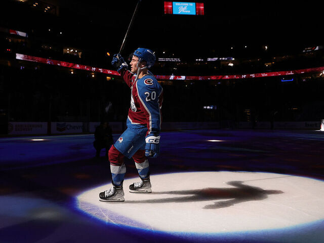 DENVER, COLORADO - OCTOBER 18: Ross Colton #20 of the Colorado Avalanche salutes the crowd after being named third star of the game against the Anaheim Ducks at Ball Arena on October 18, 2024 in Denver, Colorado. The Avalanche defeated the Ducks 4-3 in overtime.