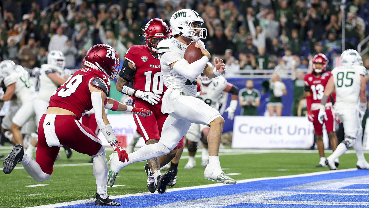 DETROIT, MICHIGAN - DECEMBER 07: Parker Navarro #13 of the Ohio Bobcats runs for a touchdown during the first quarter of the MAC Championship game against the Miami of Ohio Redhawks at Ford Field on December 07, 2024 in Detroit, Michigan.