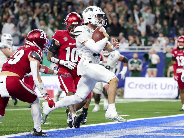 DETROIT, MICHIGAN - DECEMBER 07: Parker Navarro #13 of the Ohio Bobcats runs for a touchdown during the first quarter of the MAC Championship game against the Miami of Ohio Redhawks at Ford Field on December 07, 2024 in Detroit, Michigan.