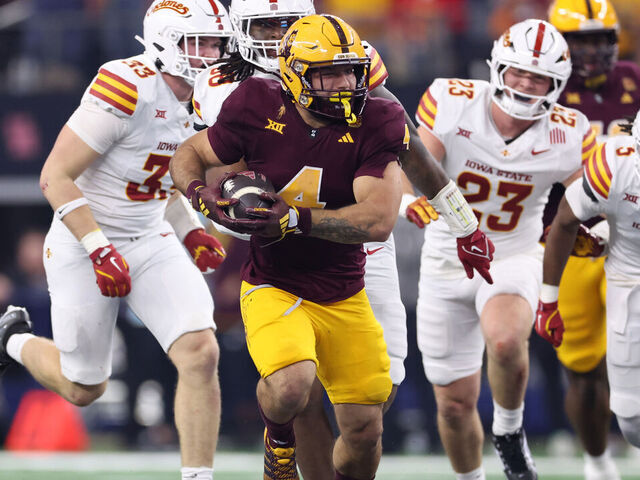 ARLINGTON, TEXAS - DECEMBER 07: Cam Skattebo #4 of the Arizona State Sun Devils carries the ball against the Iowa State Cyclones during the second quarter of the Big 12 Championship game at AT&T Stadium on December 07, 2024 in Arlington, Texas.