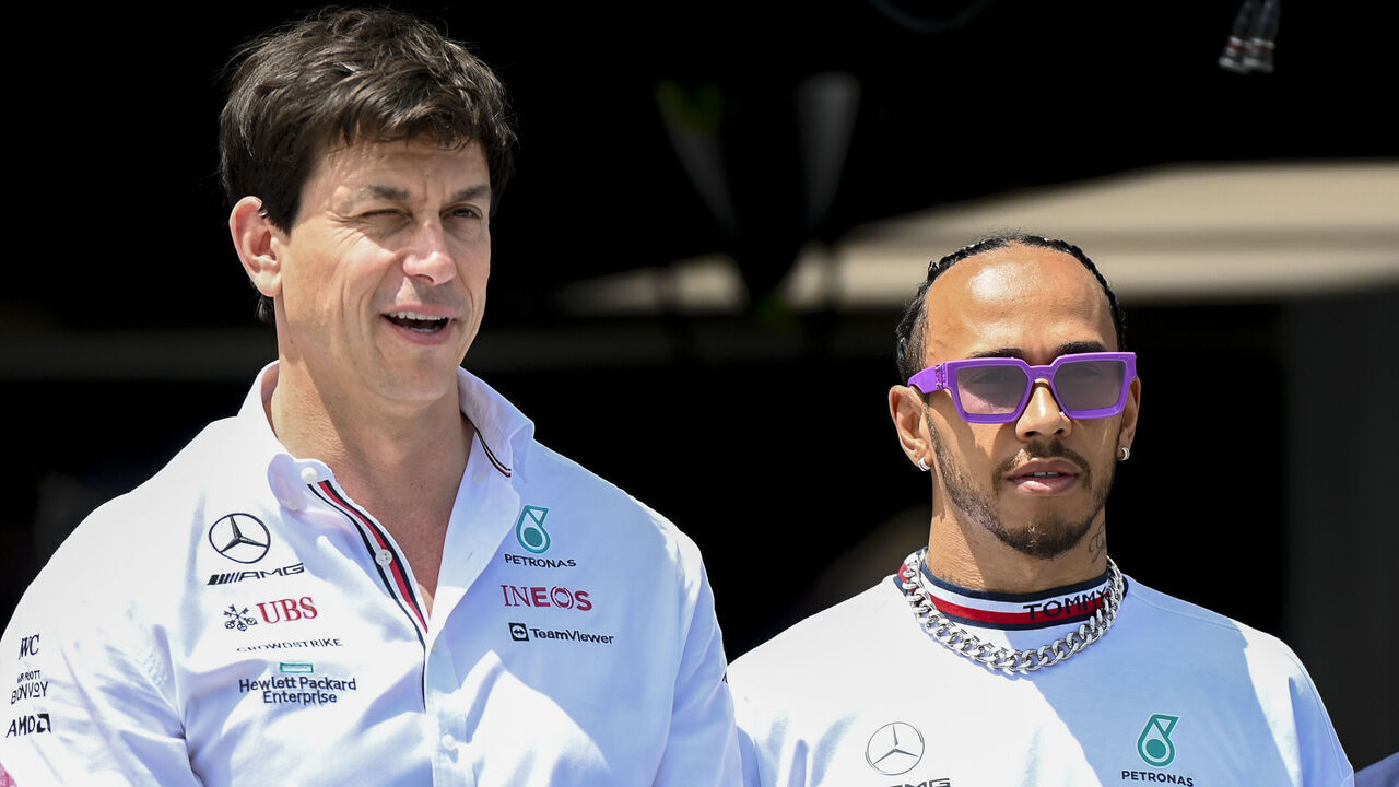 MIAMI GARDENS, FL - MAY 08: Mercedes-AMG Petronas Team Principal & CEO Toto Wolff and Mercedes-AMG Petronas driver Lewis Hamilton (right) talk prior to the start of the Formula 1 CRYPTO.COM Miami Grand Prix on May 8, 2022 at Miami Autodrome in Miami Gardens, FL.
