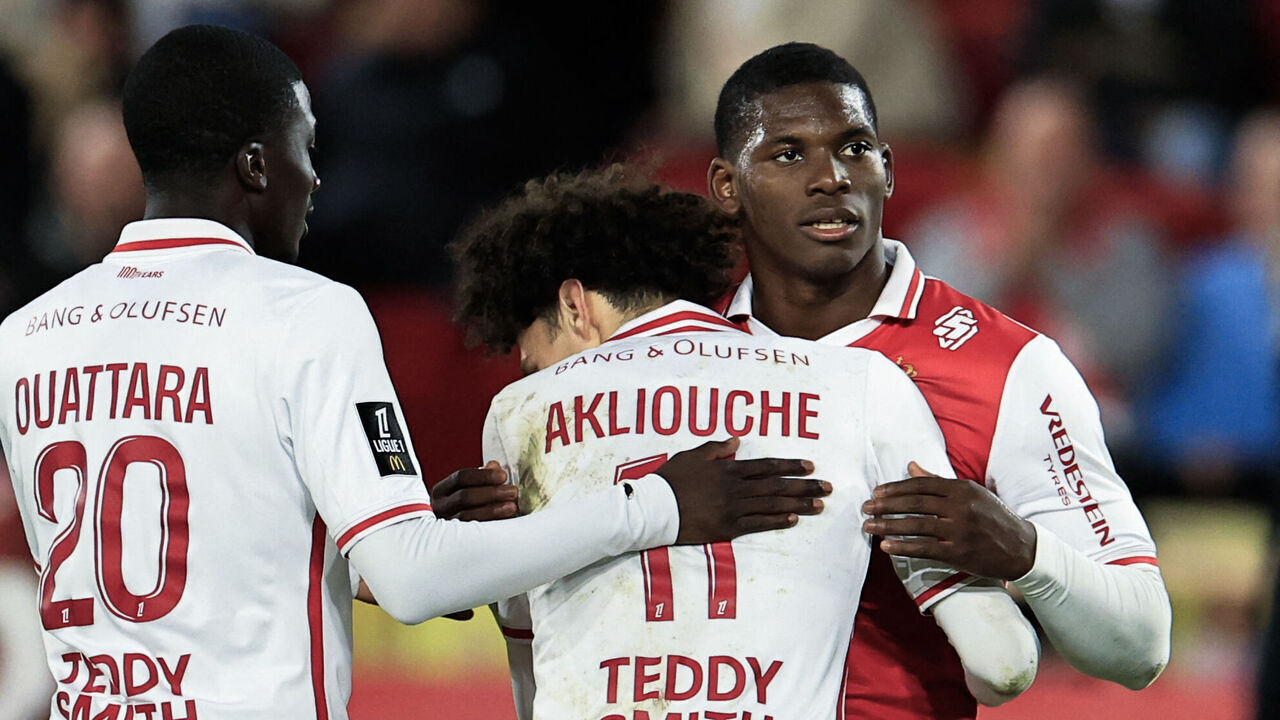 Monaco's Swiss forward #36 Breel Embolo (R) celebrates with his teammates Monaco's French defender #20 Kassoum Ouattara (L) and Monaco's French midfielder #11 Maghnes Akliouche (C) after scoring his team's second goal during the French L1 football match between AS Monaco and Toulouse FC at the Louis II Stadium (Stade Louis II) in the Principality of Monaco on December 7, 2024.