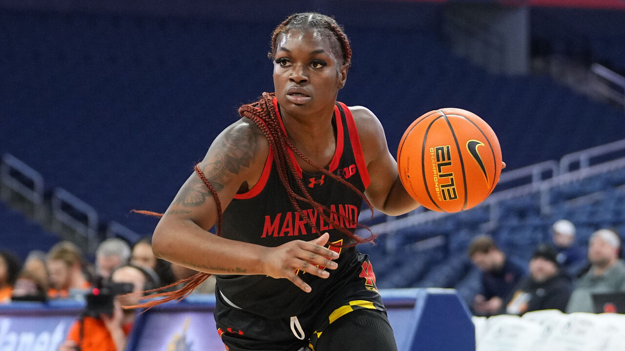 SYRACUSE, NY - NOVEMBER 13: Maryland Terrapins Guard Bri McDaniel (24) dribbles the ball towards the basket during the first half of the Women's College Basketball game between the Maryland Terrapins and the Syracuse Orange on November 13, 2024, at the JMA Wireless Dome in Syracuse, NY.
