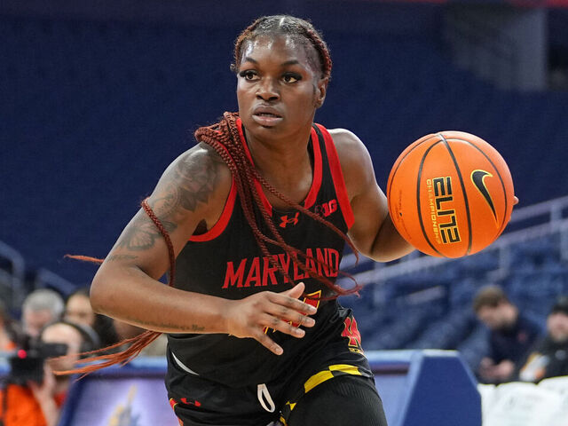 SYRACUSE, NY - NOVEMBER 13: Maryland Terrapins Guard Bri McDaniel (24) dribbles the ball towards the basket during the first half of the Women's College Basketball game between the Maryland Terrapins and the Syracuse Orange on November 13, 2024, at the JMA Wireless Dome in Syracuse, NY.