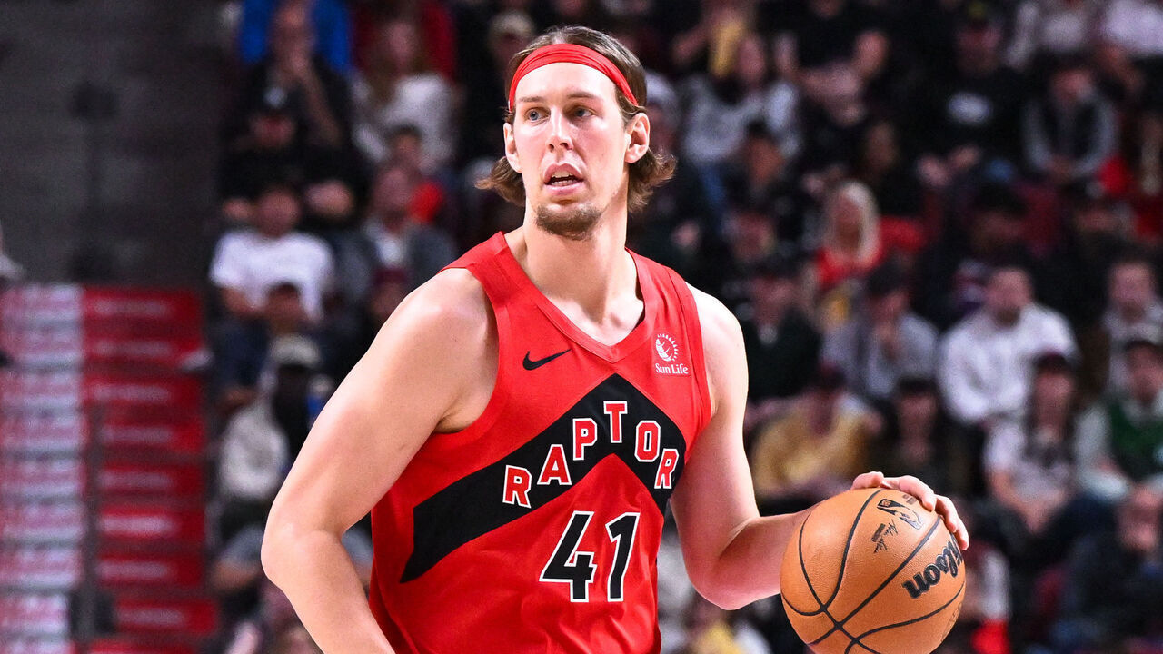 MONTREAL, CANADA - OCTOBER 06: Kelly Olynyk #41 of the Toronto Raptors dribbles the ball during the first half in a preseason NBA game against the Washington Wizards at the Bell Centre on October 6, 2024 in Montreal, Quebec, Canada. The Toronto Raptors defeated the Washington Wizards 125-98.