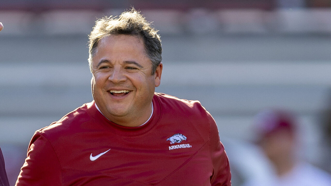 FAYETTEVILLE, ARKANSAS - SEPTEMBER 17: Head Coach Bobby Petrino of the Missouri State Bears talks on the field before a game with Tight Ends Coach Dowell Loggains the Arkansas Razorbacks at Donald W. Reynolds Razorback Stadium on September 17, 2022 in Fayetteville, Arkansas. The Razorbacks defeated the Bears 38-27.