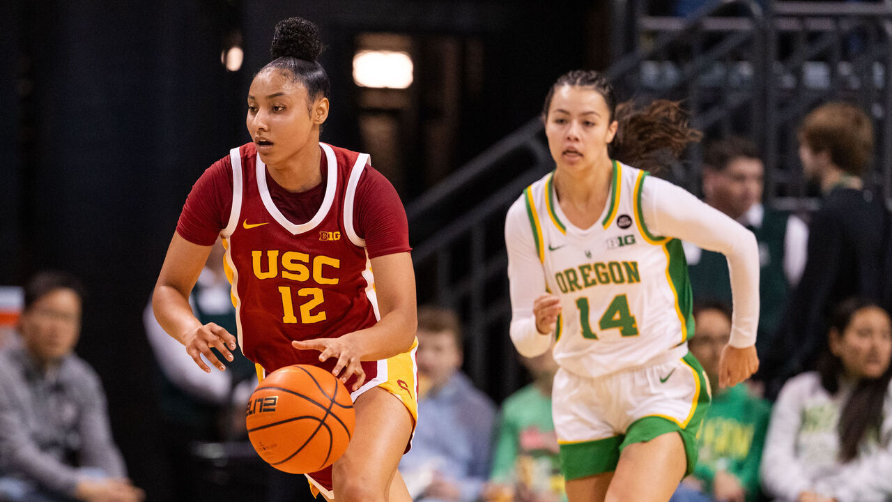 EUGENE, OREGON - DECEMBER 7: JuJu Watkins #12 of the USC Trojans dribbles the ball down the court during the second quarter of the game against the Oregon Ducks at Matthew Knight Arena on December 7, 2024 in Eugene, Oregon.