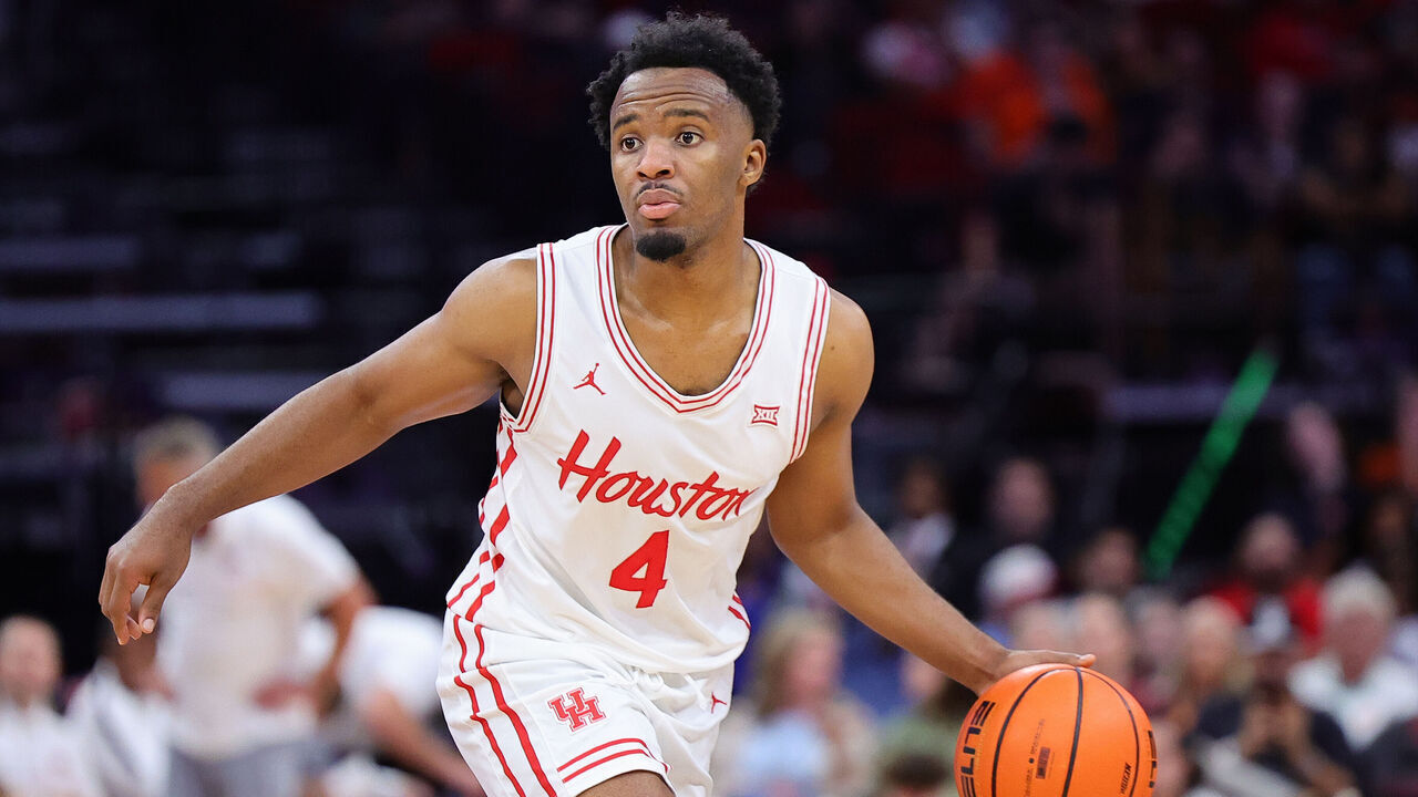HOUSTON, TEXAS - NOVEMBER 09: L.J. Cryer #4 of the Houston Cougars drives against the Auburn Tigers during the second half of the Mattress Firm Battleground 2k24 at Toyota Center on November 09, 2024 in Houston, Texas.