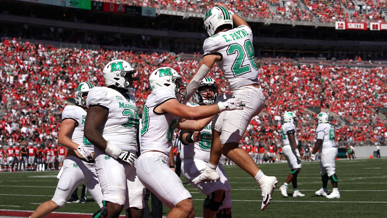 COLUMBUS, OHIO - SEPTEMBER 21: Running back Ethan Payne #28 of the Marshall Thundering Herd celebrates a touchdown with his teammates during the first quarter against the Ohio State Buckeyes at Ohio Stadium on September 21, 2024 in Columbus, Ohio.