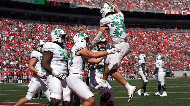COLUMBUS, OHIO - SEPTEMBER 21: Running back Ethan Payne #28 of the Marshall Thundering Herd celebrates a touchdown with his teammates during the first quarter against the Ohio State Buckeyes at Ohio Stadium on September 21, 2024 in Columbus, Ohio.