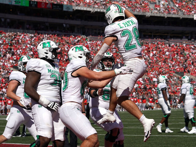 COLUMBUS, OHIO - SEPTEMBER 21: Running back Ethan Payne #28 of the Marshall Thundering Herd celebrates a touchdown with his teammates during the first quarter against the Ohio State Buckeyes at Ohio Stadium on September 21, 2024 in Columbus, Ohio.