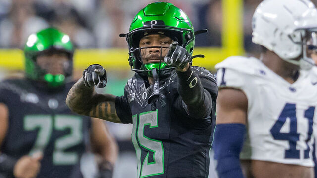 INDIANAPOLIS, INDIANA - DECEMBER 7: Tez Johnson #15 of the Oregon Ducks reacts after a first down during the first half of the 2024 Big Ten Football Championship game against the Penn State Nittany Lions at Lucas Oil Stadium on December 7, 2024 in Indianapolis, Indiana.