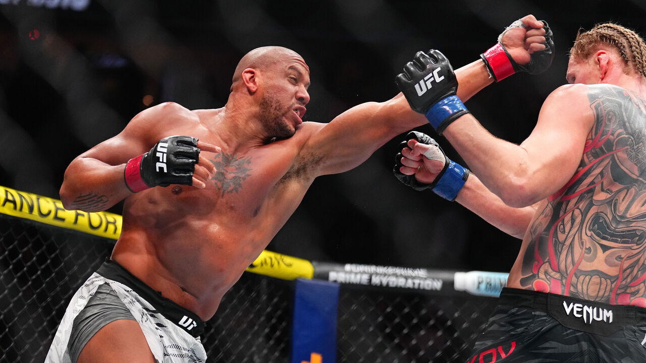 LAS VEGAS, NEVADA - DECEMBER 07: (L-R) Ciryl Gane of France punches Alexander Volkov of Russia in a heavyweight bout during the UFC 310 event at T-Mobile Arena on December 07, 2024 in Las Vegas, Nevada.