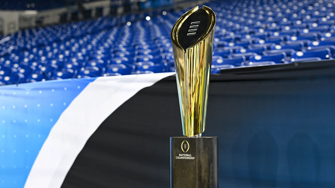 INDIANAPOLIS, IN - JULY 23: The College Football Playoff (CFP) Championship trophy sits on display during the 2024 Big Ten Media Days on July 23, 2024 at Lucas Oil Stadium in Indianapolis, IN.
