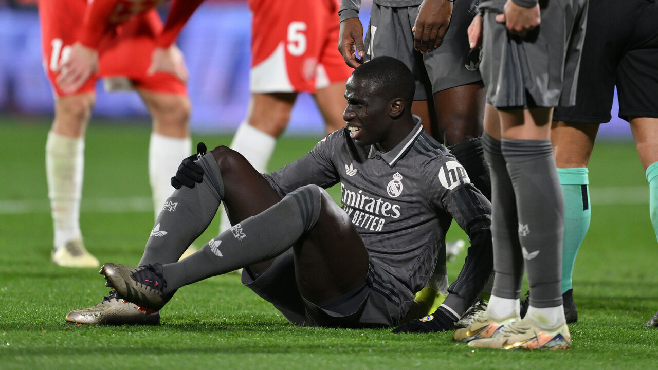 GIRONA, SPAIN - DECEMBER 07: Ferland Mendy of Real Madrid reacts after picking up an injury, before leaving the pitch following medical treatment, during the LaLiga match between Girona FC and Real Madrid CF at Montilivi Stadium on December 07, 2024 in Girona, Spain.