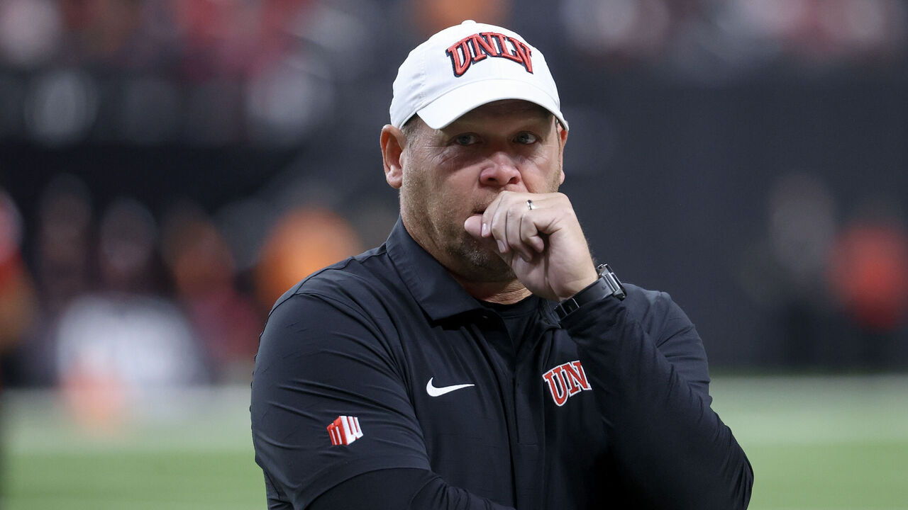 LAS VEGAS, NEVADA - OCTOBER 04: Head coach Barry Odom of the UNLV Rebels looks on prior to a game against the Syracuse Orange at Allegiant Stadium on October 04, 2024 in Las Vegas, Nevada.