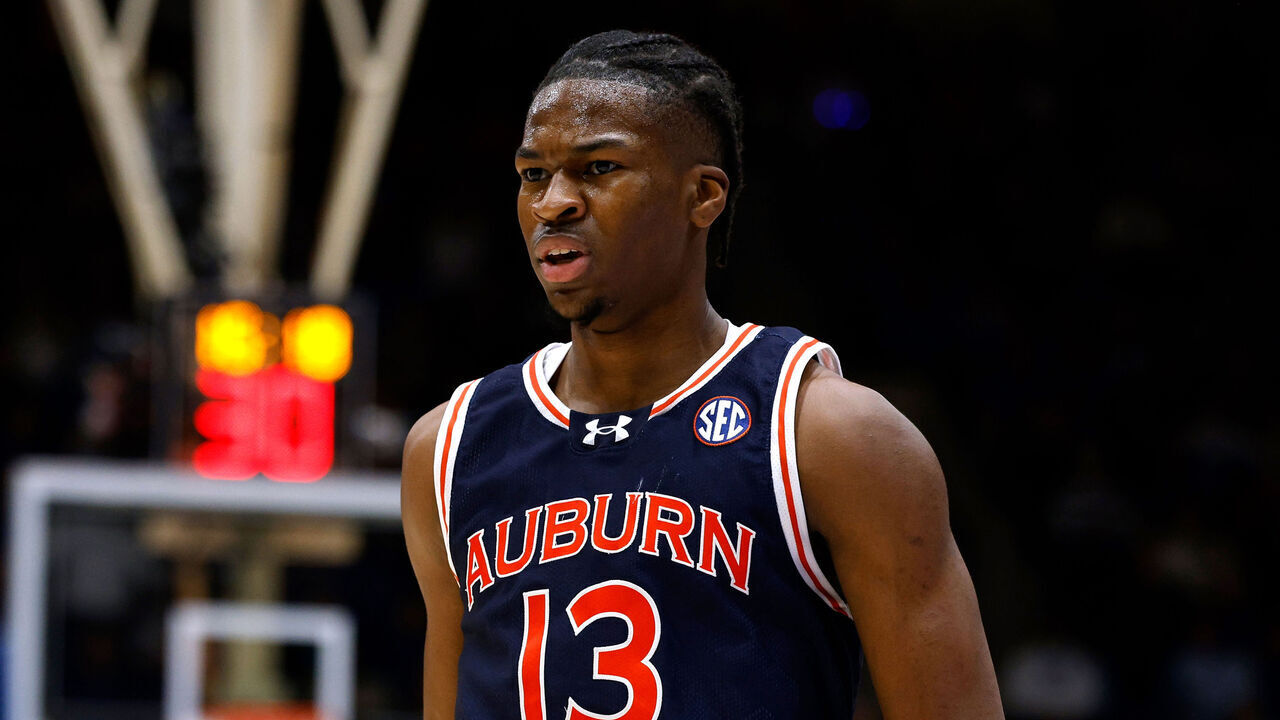 DURHAM, NORTH CAROLINA - DECEMBER 4: Miles Kelly #13 of the Auburn Tigers reacts following a three-point basket against the Duke Blue Devils at Cameron Indoor Stadium on December 4, 2024 in Durham, North Carolina.