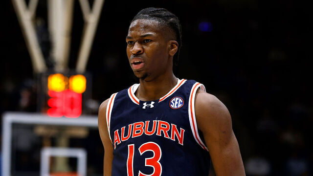 DURHAM, NORTH CAROLINA - DECEMBER 4: Miles Kelly #13 of the Auburn Tigers reacts following a three-point basket against the Duke Blue Devils at Cameron Indoor Stadium on December 4, 2024 in Durham, North Carolina.