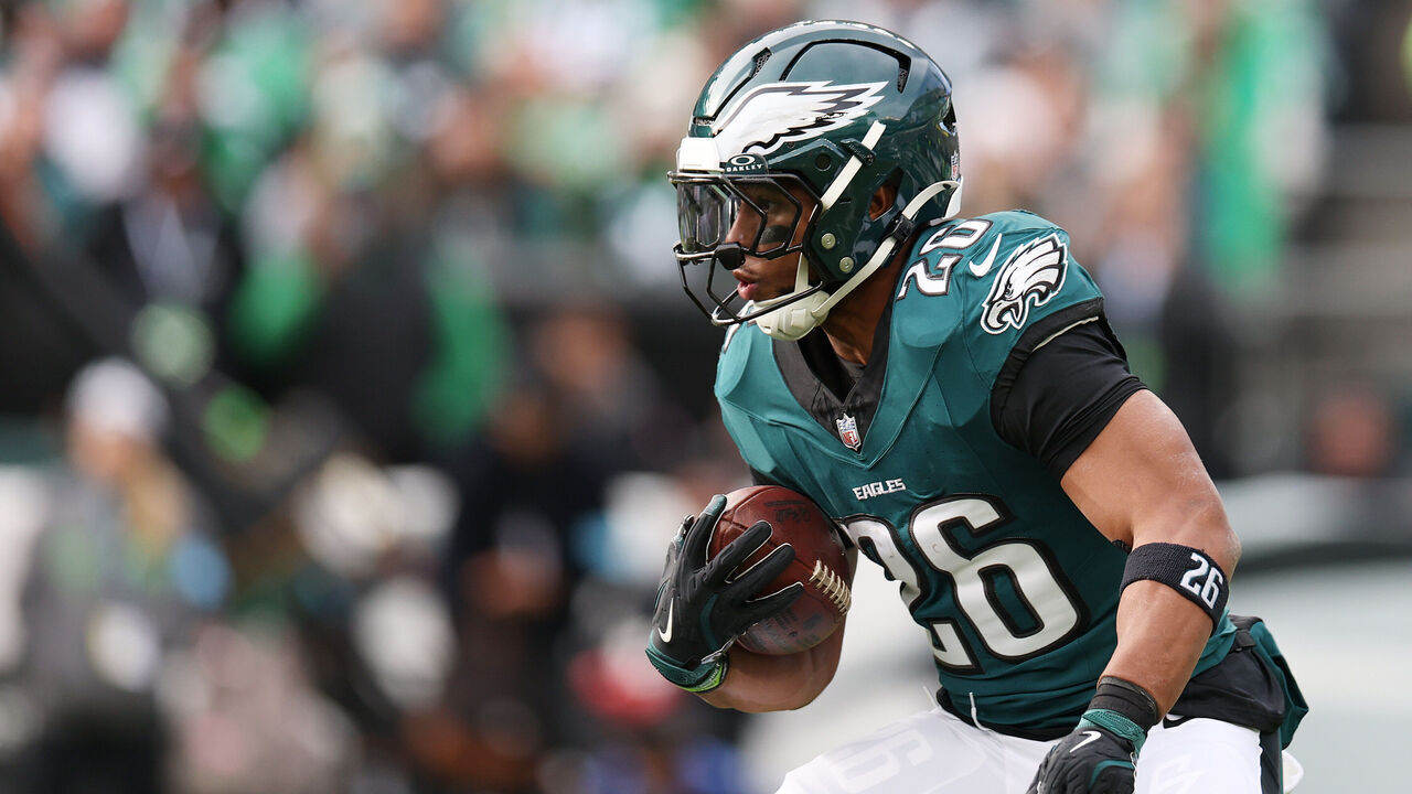 PHILADELPHIA, PENNSYLVANIA - DECEMBER 08: Saquon Barkley #26 of the Philadelphia Eagles runs the ball up the field during the first half of a game against the Carolina Panthers at Lincoln Financial Field on December 08, 2024 in Philadelphia, Pennsylvania.