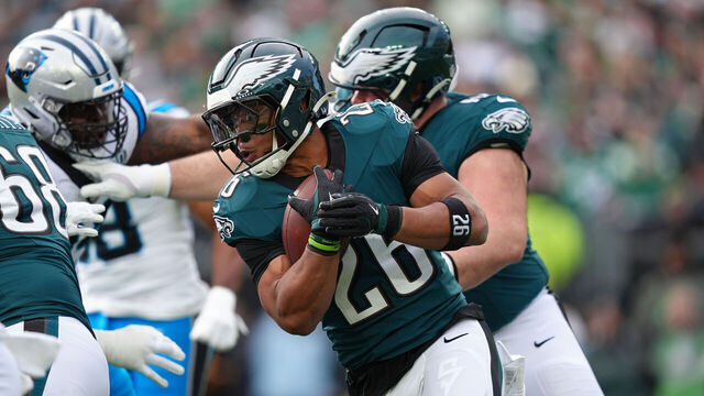 PHILADELPHIA, PA - DECEMBER 08: Philadelphia Eagles running back Saquon Barkley (26) carries the ball in the first half during the game between the Carolina Panthers and Philadelphia Eagles on December 08, 2024 at Lincoln Financial Field in Philadelphia, PA.