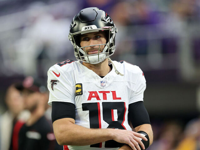 MINNEAPOLIS, MINNESOTA - DECEMBER 08: Kirk Cousins #18 of the Atlanta Falcons looks on before the game against the Minnesota Vikings at U.S. Bank Stadium on December 08, 2024 in Minneapolis, Minnesota.