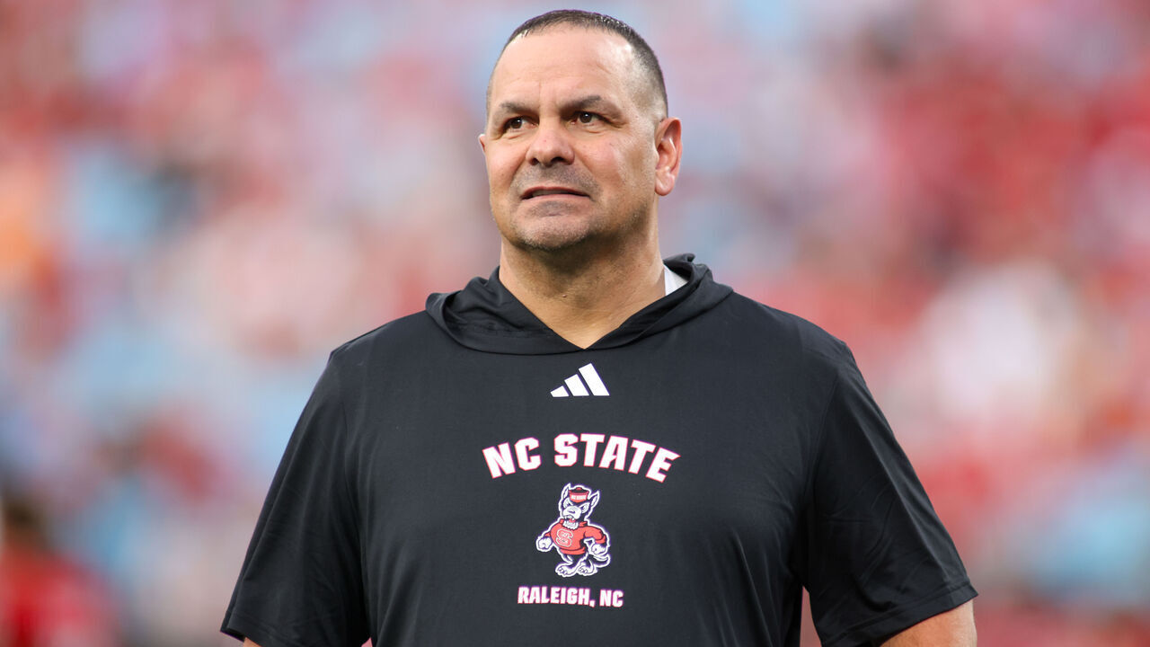 CHARLOTTE, NC - SEPTEMBER 07: North Carolina State Wolfpack defensive coordinator Tony Gibson looks to his team before the college football game between the North Carolina State Wolfpack and the Tennessee Volunteers on September 7, 2024 at Bank of America Stadium in Charlotte, NC.