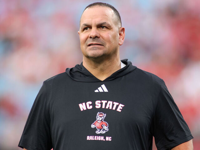 CHARLOTTE, NC - SEPTEMBER 07: North Carolina State Wolfpack defensive coordinator Tony Gibson looks to his team before the college football game between the North Carolina State Wolfpack and the Tennessee Volunteers on September 7, 2024 at Bank of America Stadium in Charlotte, NC.