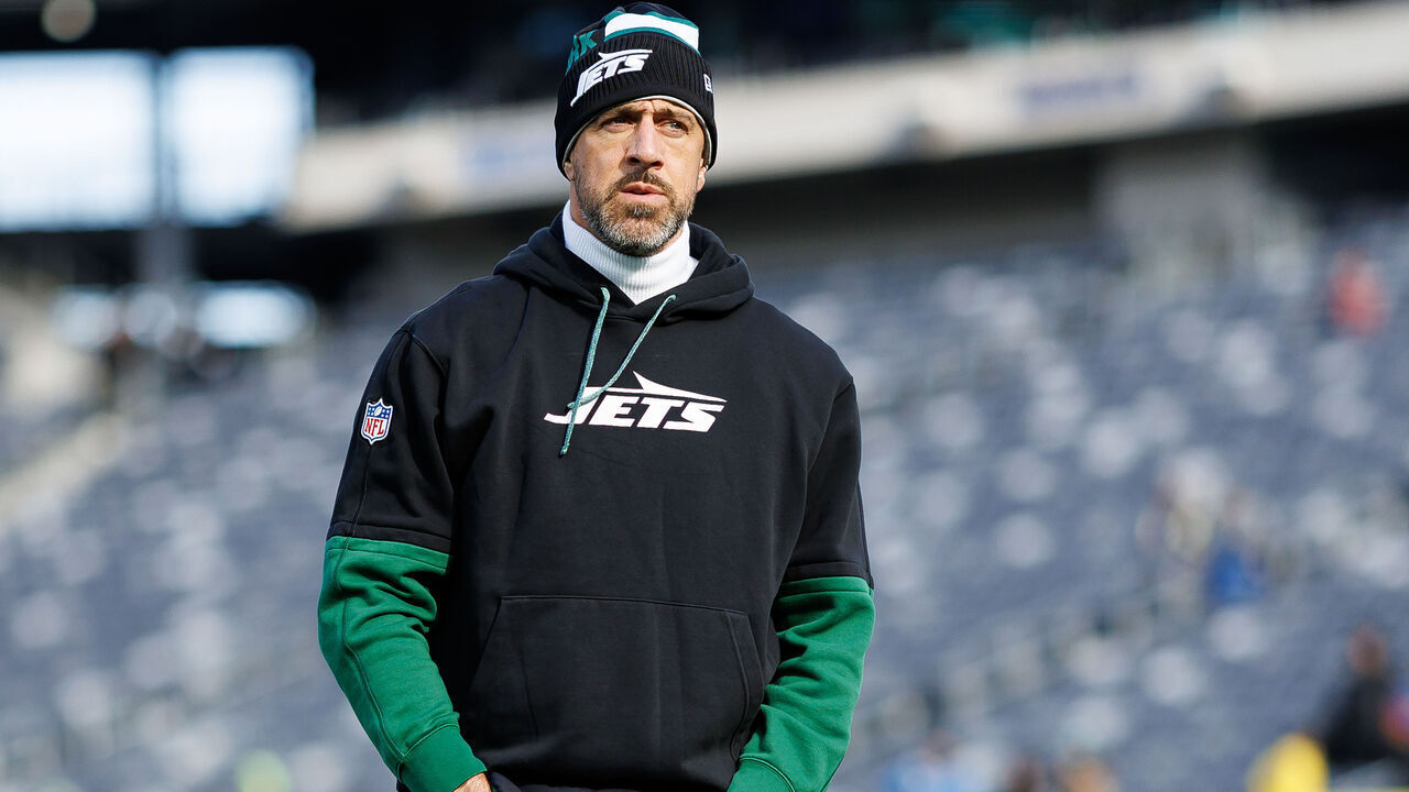 EAST RUTHERFORD, NEW JERSEY - DECEMBER 1: Quarterback Aaron Rodgers #8 of the New York Jets stands on the field prior to an NFL football game against the Seattle Seahawks, at MetLife Stadium on December 1, 2024 in East Rutherford, New Jersey.